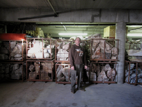 Randy at home in his basement stone yard
