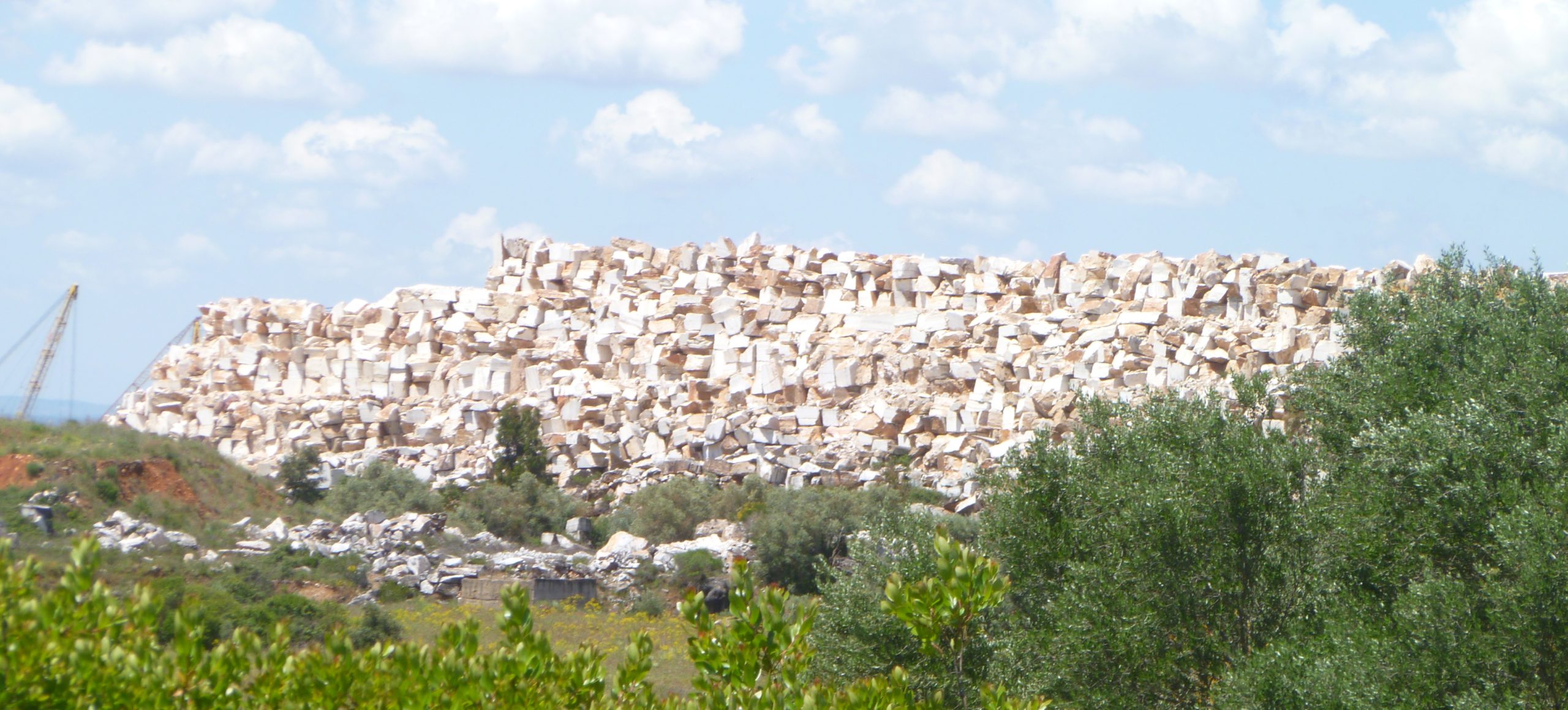 Three story tall mountain of marble scrap