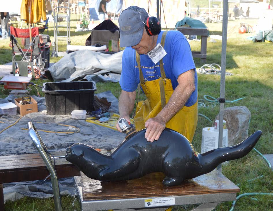 Bruce working on "River Otter" 42"x12"x12", columnar basalt