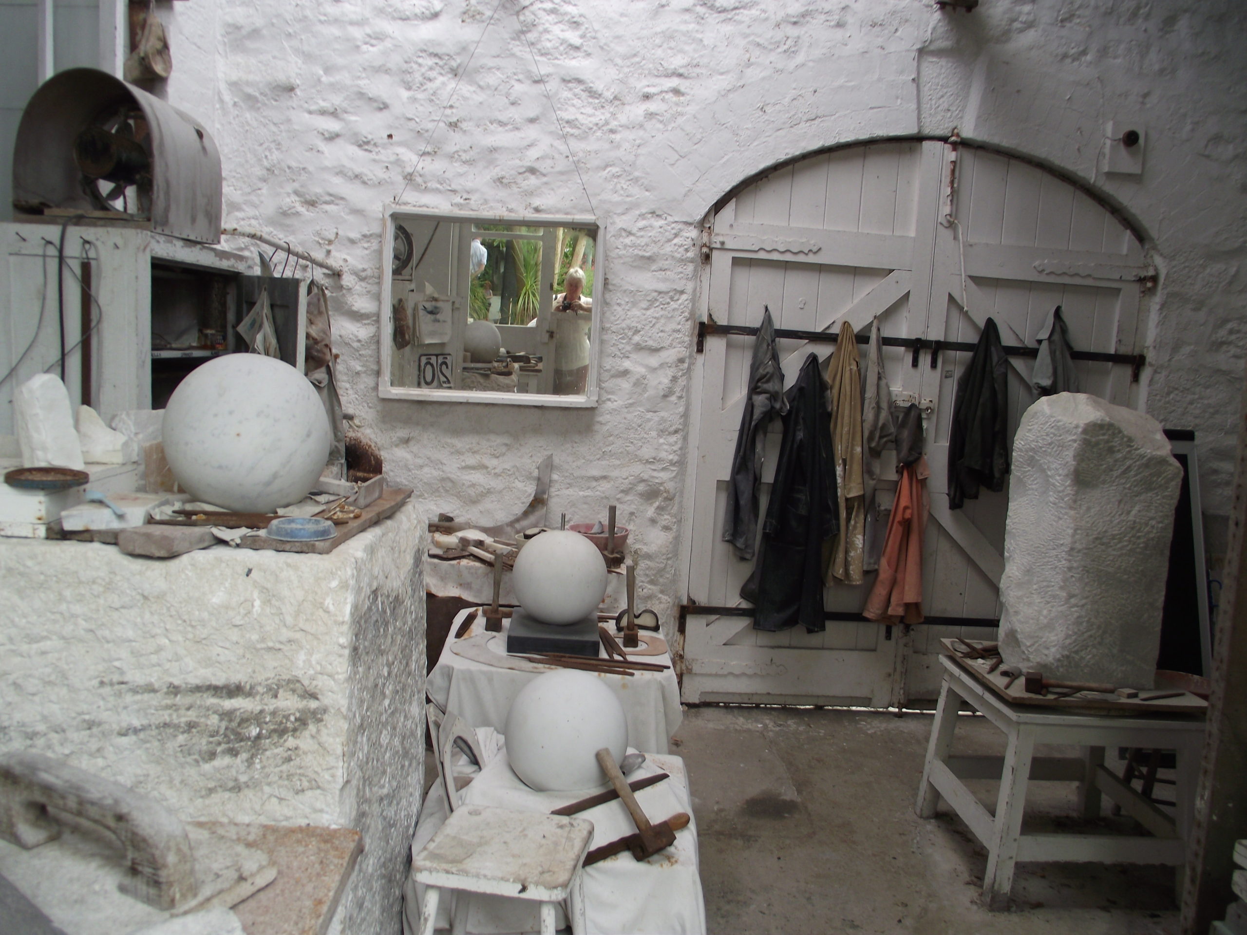 Barbara’s Trewyn studio showing some of her projects under way at the time of her death in l975. (Photo by Arliss Newcomb, seen in the wall mirror.)